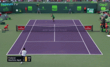Roger Federer returns